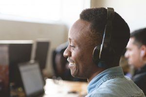African man working in a call centre